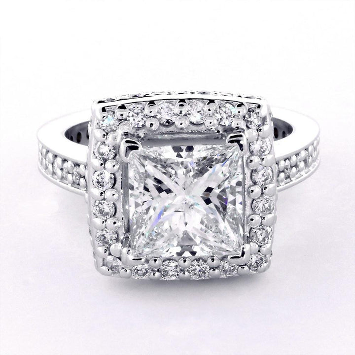 Halo Engagement Ring Setting for a Princess Cut Diamond, 0.86CT Sides in 14k White Gold