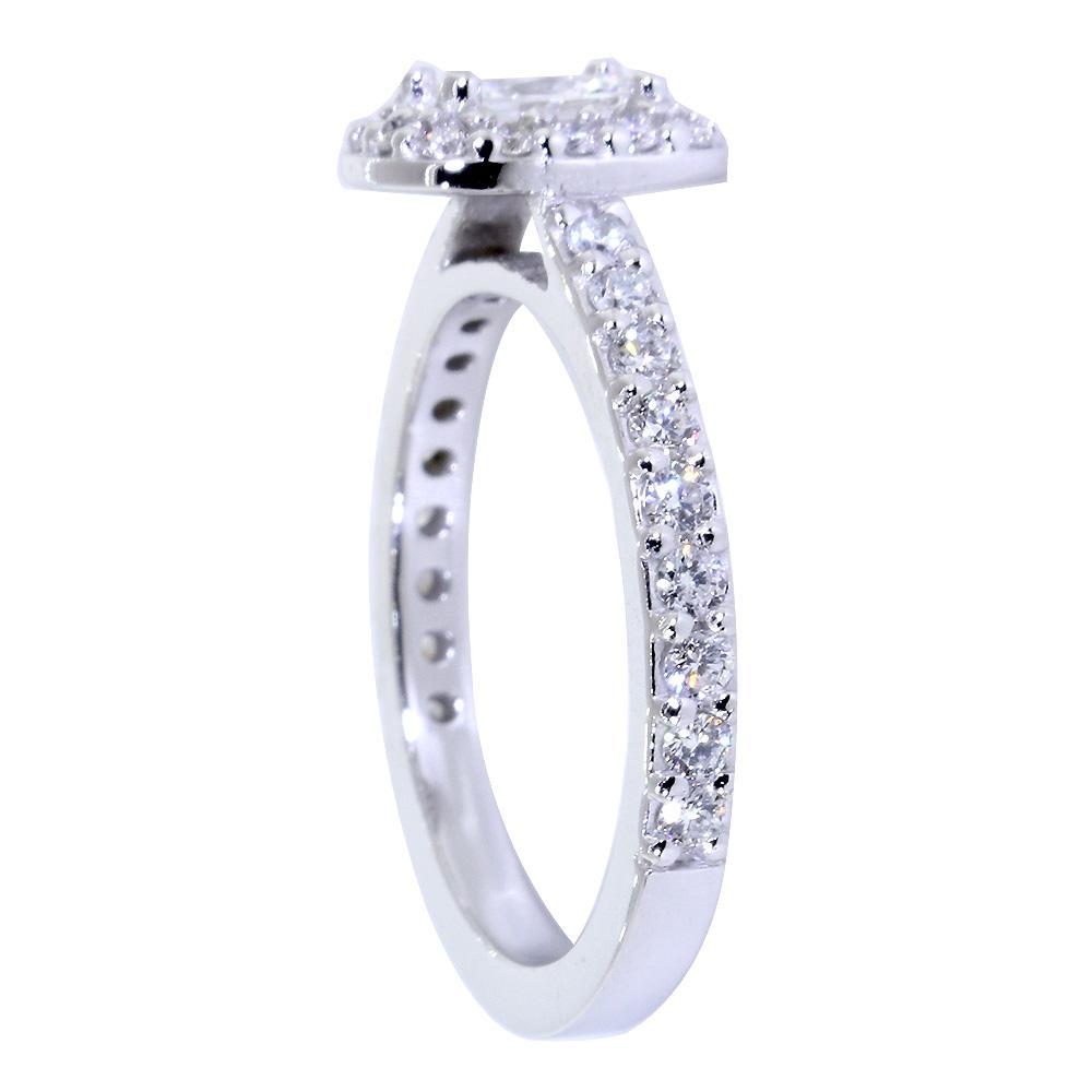 Halo Engagement Ring Setting for an Oval Diamond, 0.71CT Total Sides in 14k White Gold
