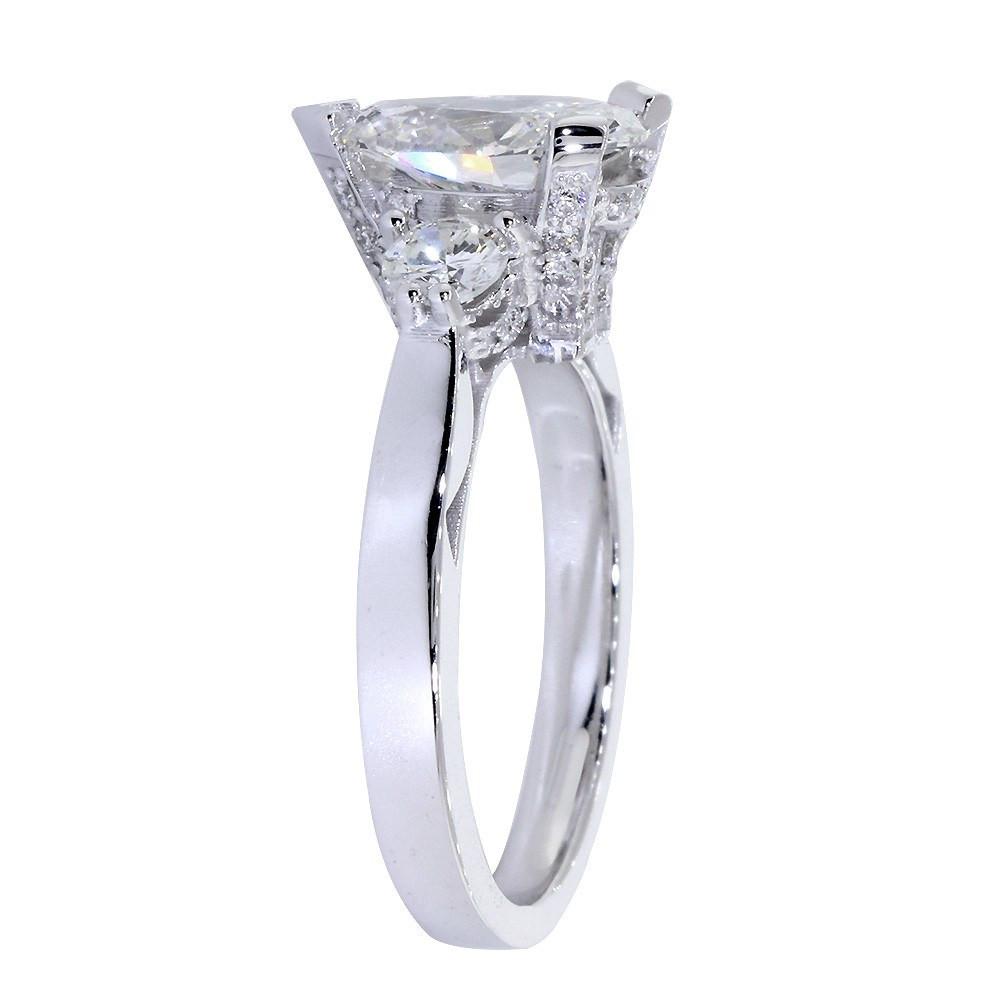 Engagement Ring Setting for a Pear Shape Diamond, 0.72CT Sides in 14k White Gold