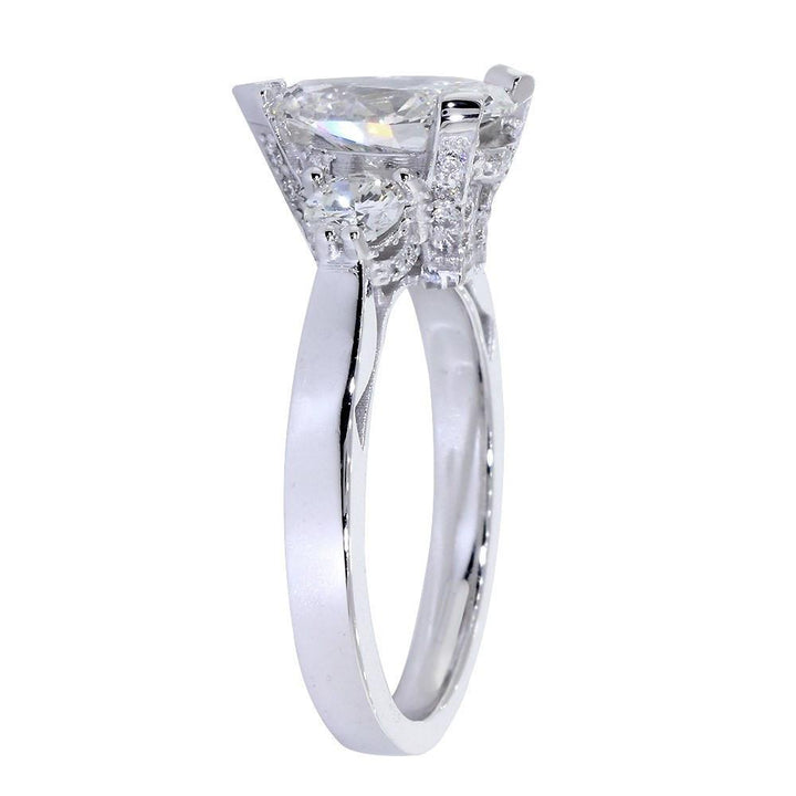 Engagement Ring Setting for a Pear Shape Diamond, 0.72CT Sides in 14k White Gold