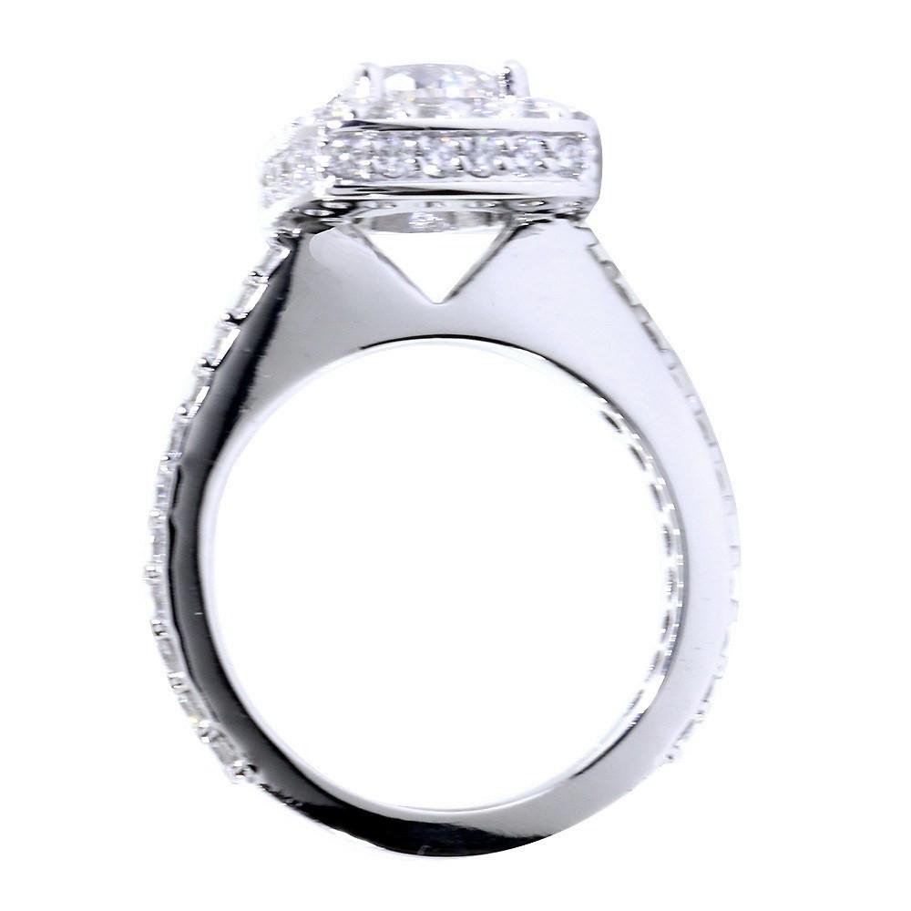 Halo Engagement Ring Setting for a Round Diamond, 1.00CT Total Sides in 14k White Gold