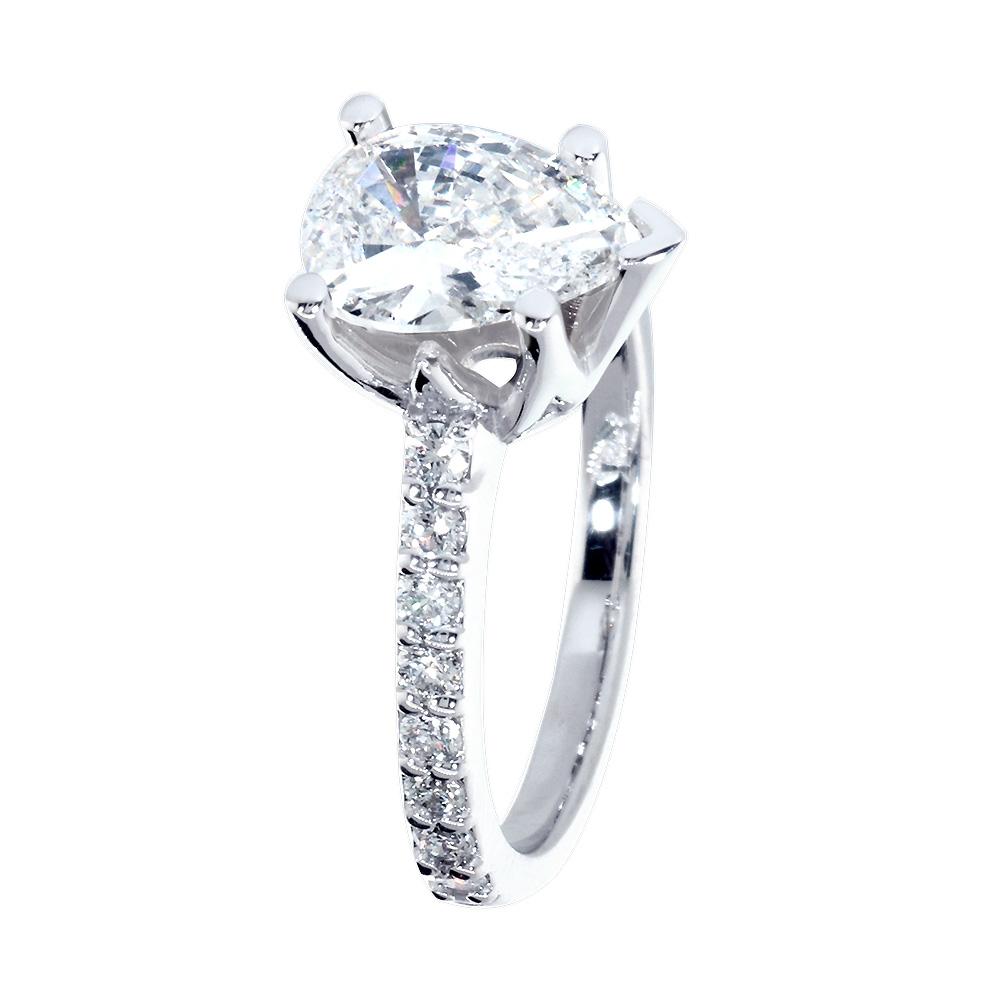 Engagement Ring Setting for a Pear Shape Diamond Center, 0.48CT Sides in 14k White Gold