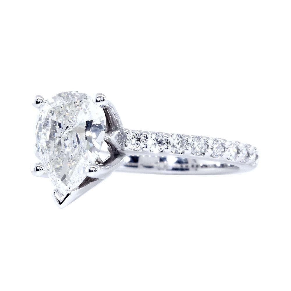 Engagement Ring Setting for a Pear Shape Diamond Center, 0.48CT Sides in 14k White Gold